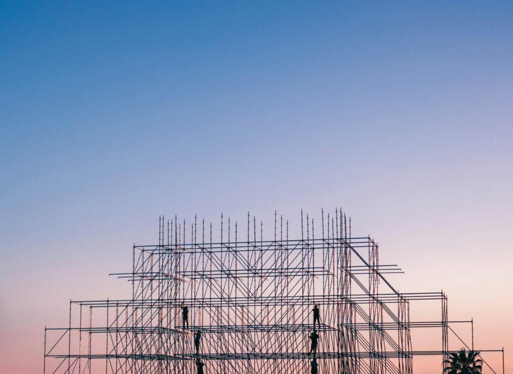 pexels photo 1117452 1117452 A silhouetted structure against a colorful sunset, showcasing industrial scaffolding in Sochi, Russia.